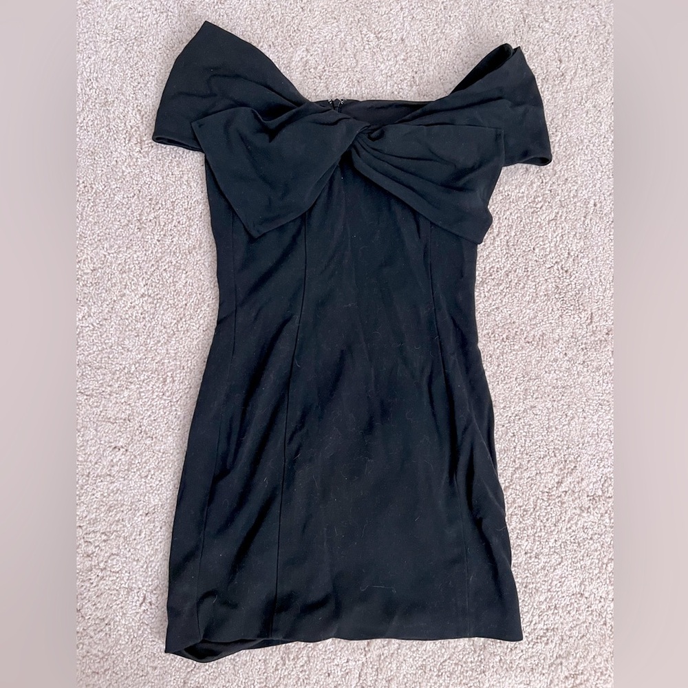 Black off shoulder mini dress with bow design in front